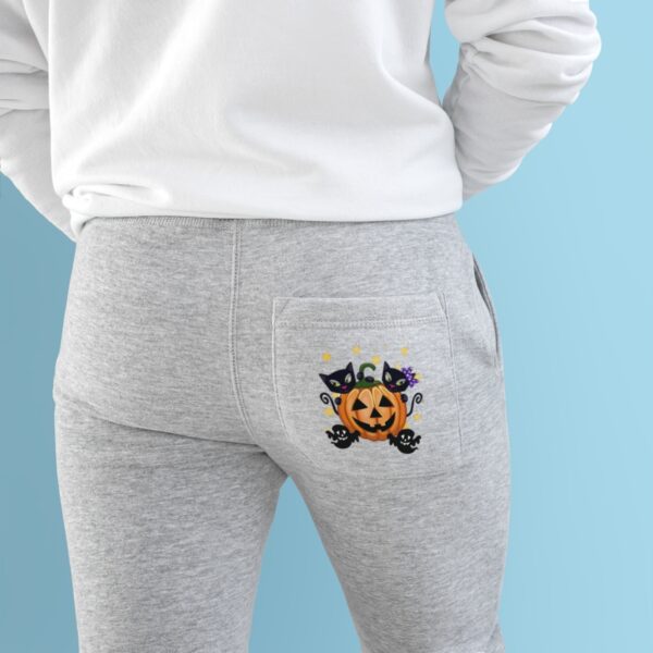 Pumpkin Smiley Unisex Fleece Joggers heather grey mockup closeup